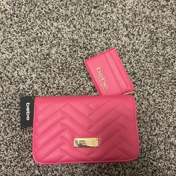 bebe Handbags - Bebe Fuchsia Quilted Clutch
